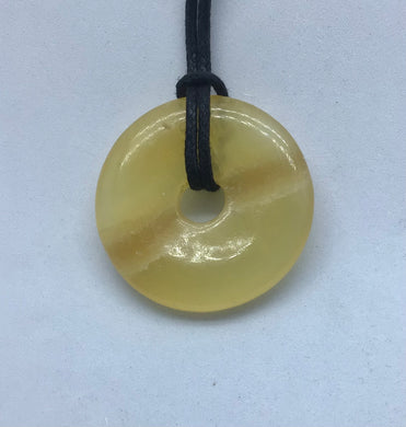Orangen-Calcit Donut - Steineladen Larimar